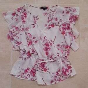 Pink and white flowered blouse